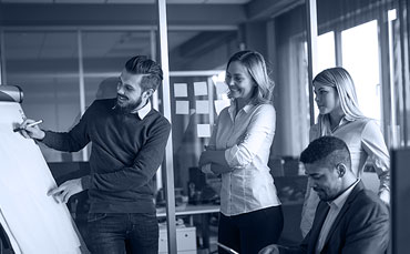A b/w image of professional people collaborating